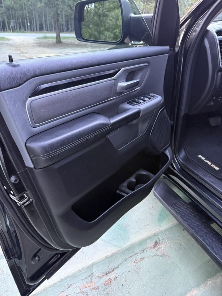 Same truck door panel cleaned and restored after detailing